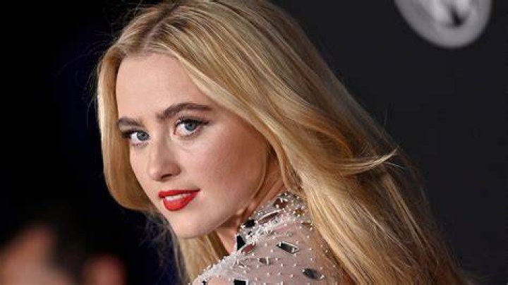 Stunning sheen: Meanwhile, Kathryn Newton wowed in a colorful, patterned shift dress with a noticeable sheen. The actress gave her petite frame a boost in a pair of purple platform heels